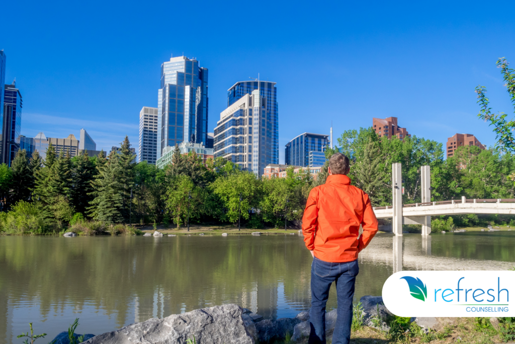 Man on the bank of bow river in Calgary